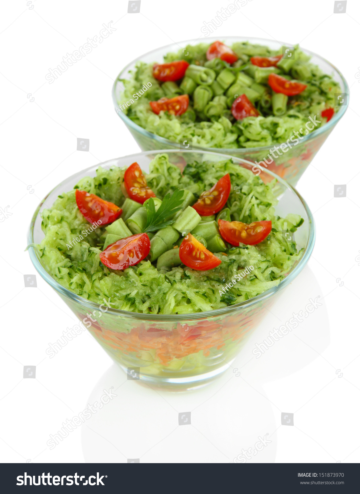 Tasty salad with fresh vegetables isolated on white Tasty salad with fresh vegetables isolated on white