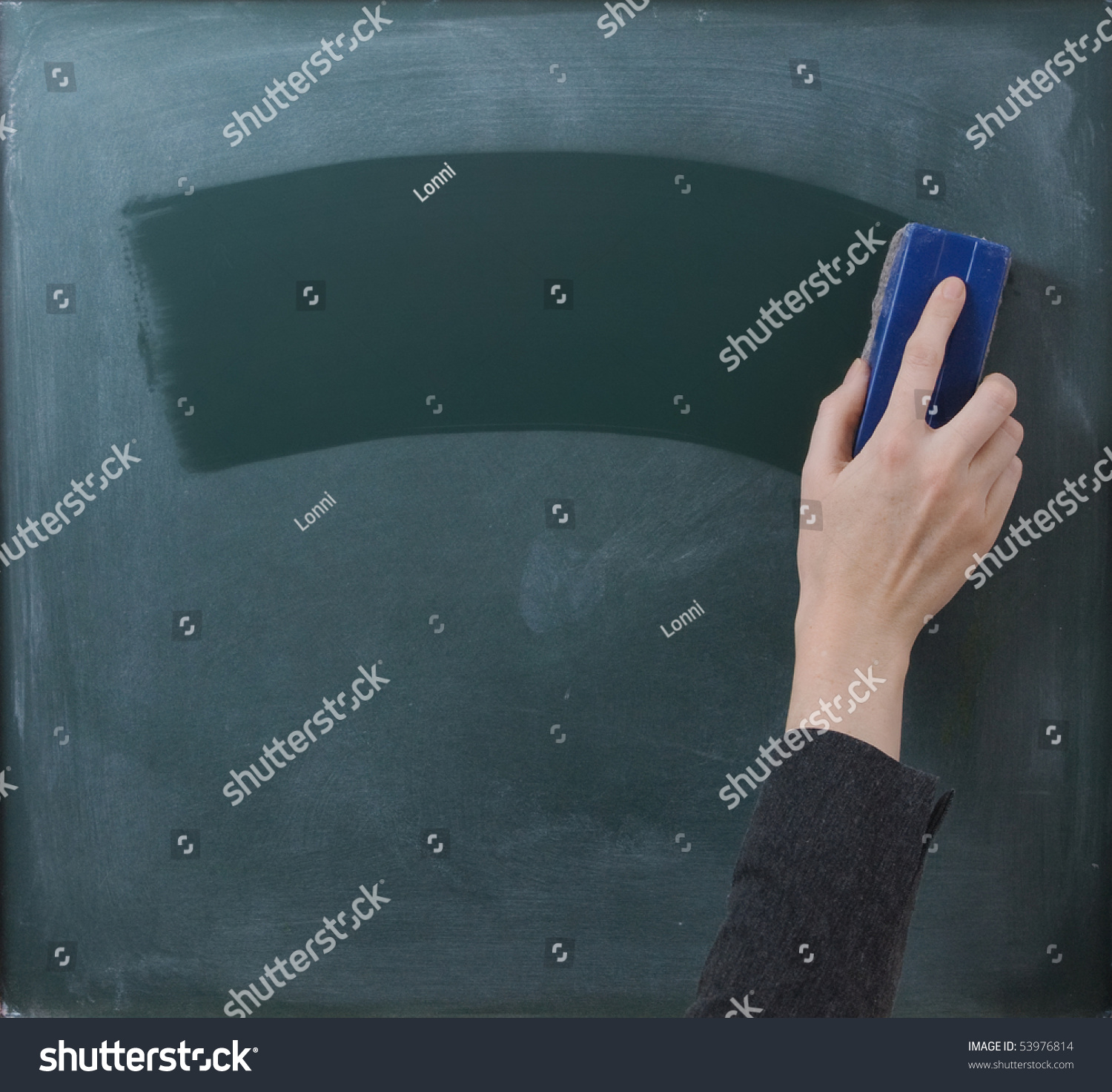 Teacher cleaning the chalkboard suits horizontal composition Teacher cleaning the chalkboard suits horizontal composition