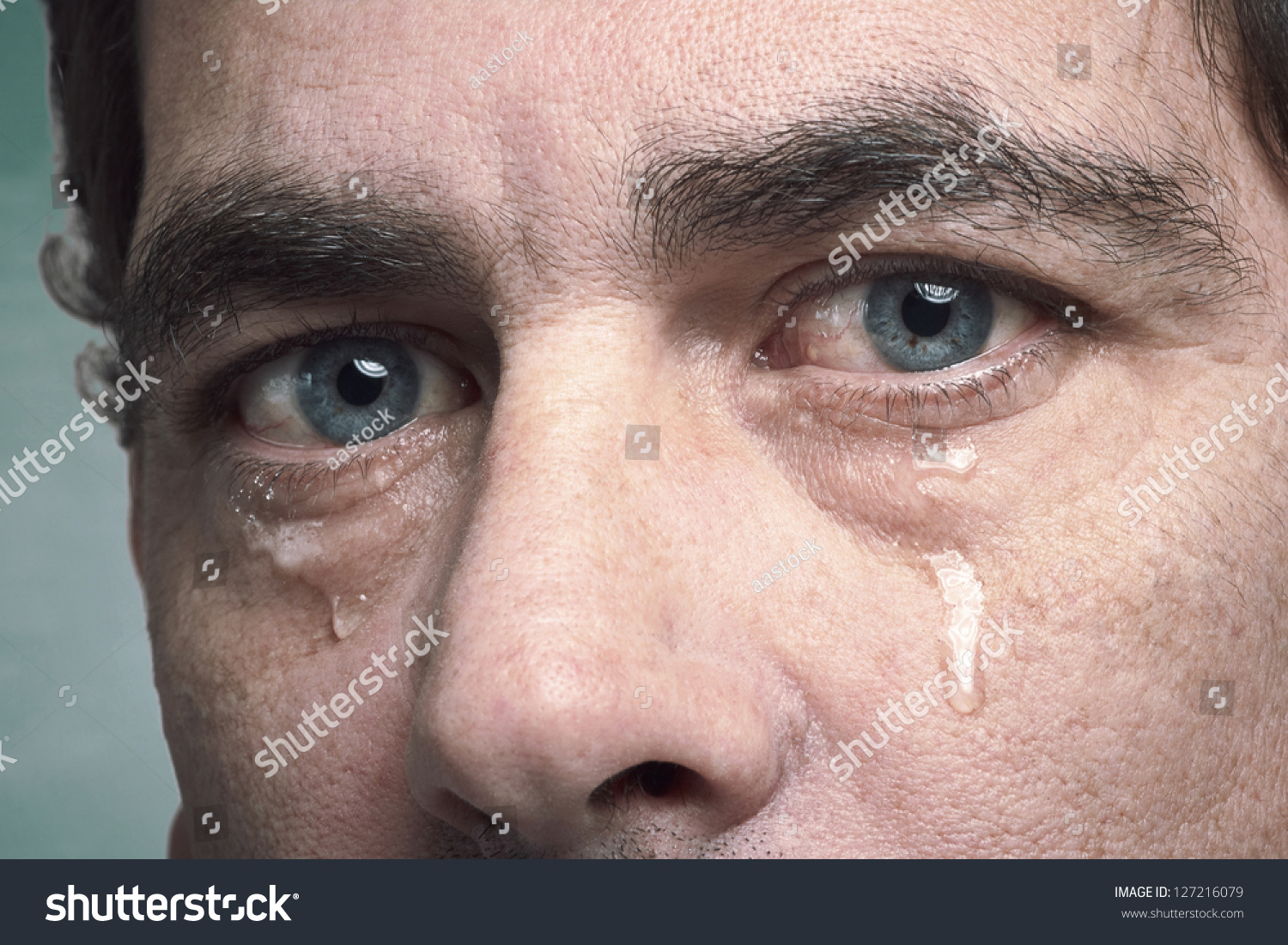 stock-photo-tears-in-eyes-of-crying-adul
