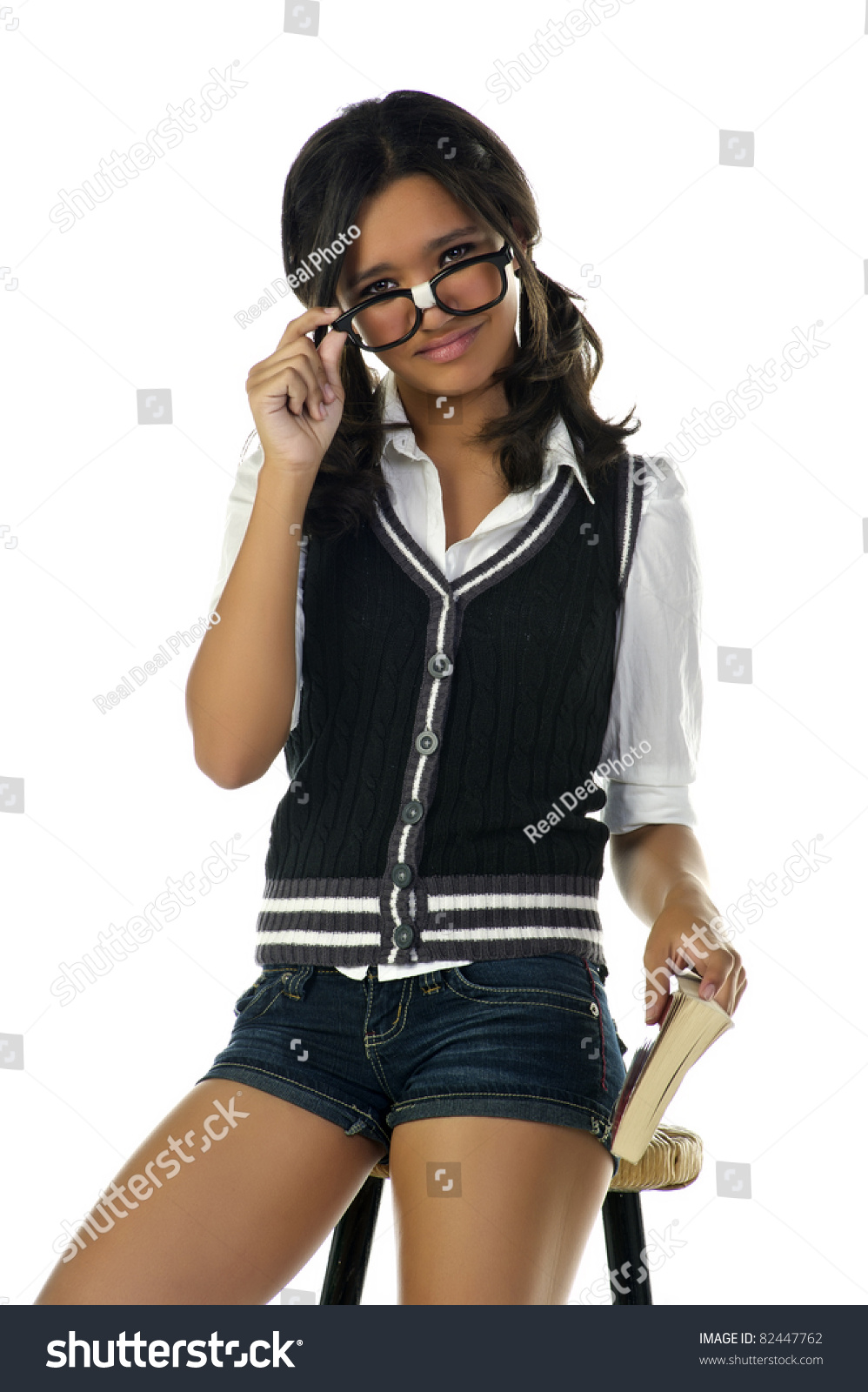 Teenage Nerd Girl With Black Glasses Sticking Out Her