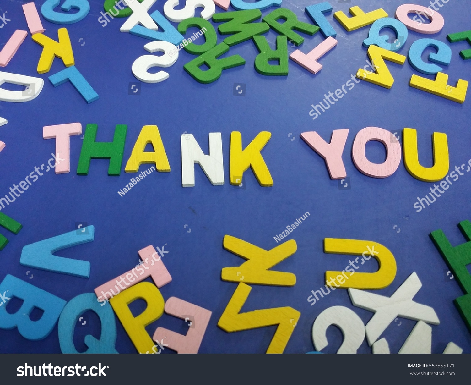 Thank you spelled with wood alphabets Thank you spelled with wood alphabets