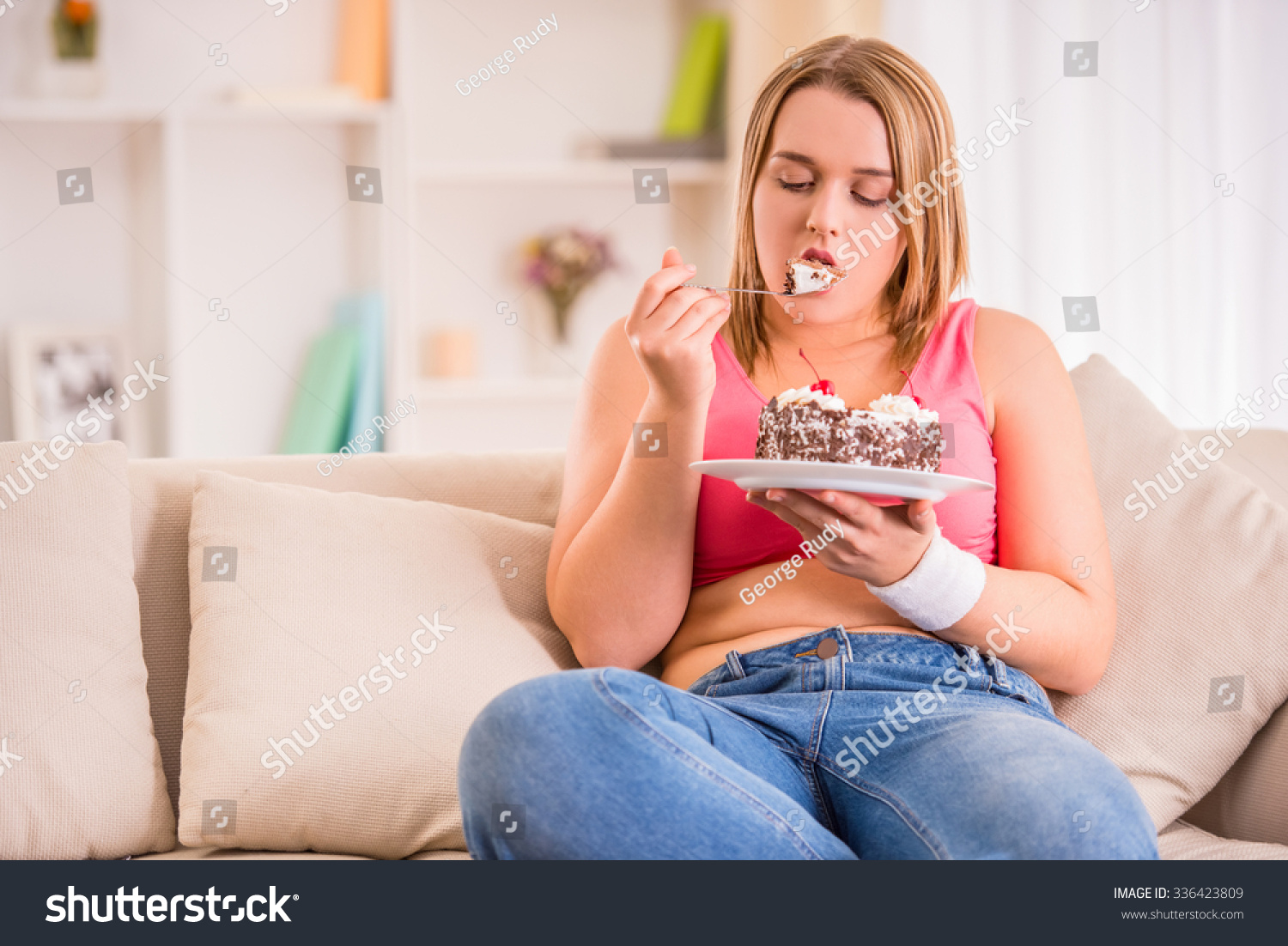 The Concept Of Healthy Eating Fat Woman Eating Cake Sitting On The