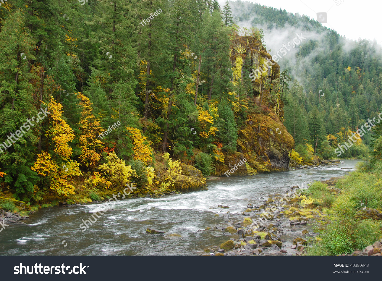 The North Umpqua River As It Passes By Some Wonderful Fall Colors And 