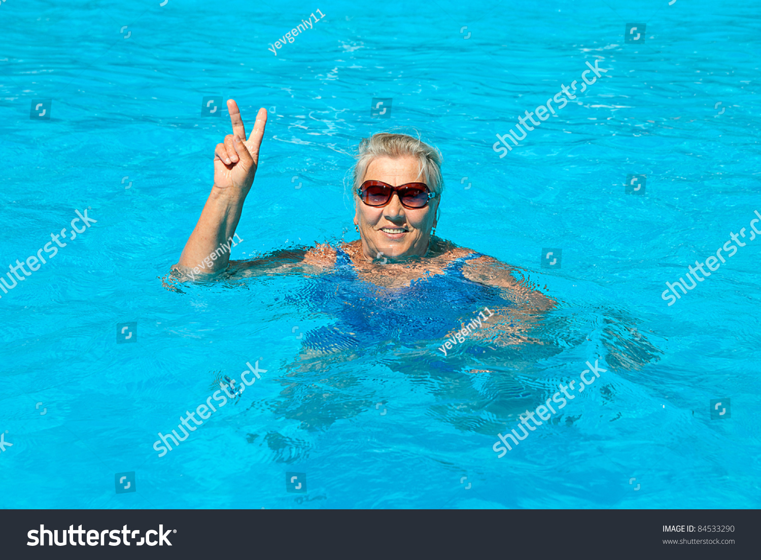 The Old Woman Years Old Swims In The Pool Stock Photo