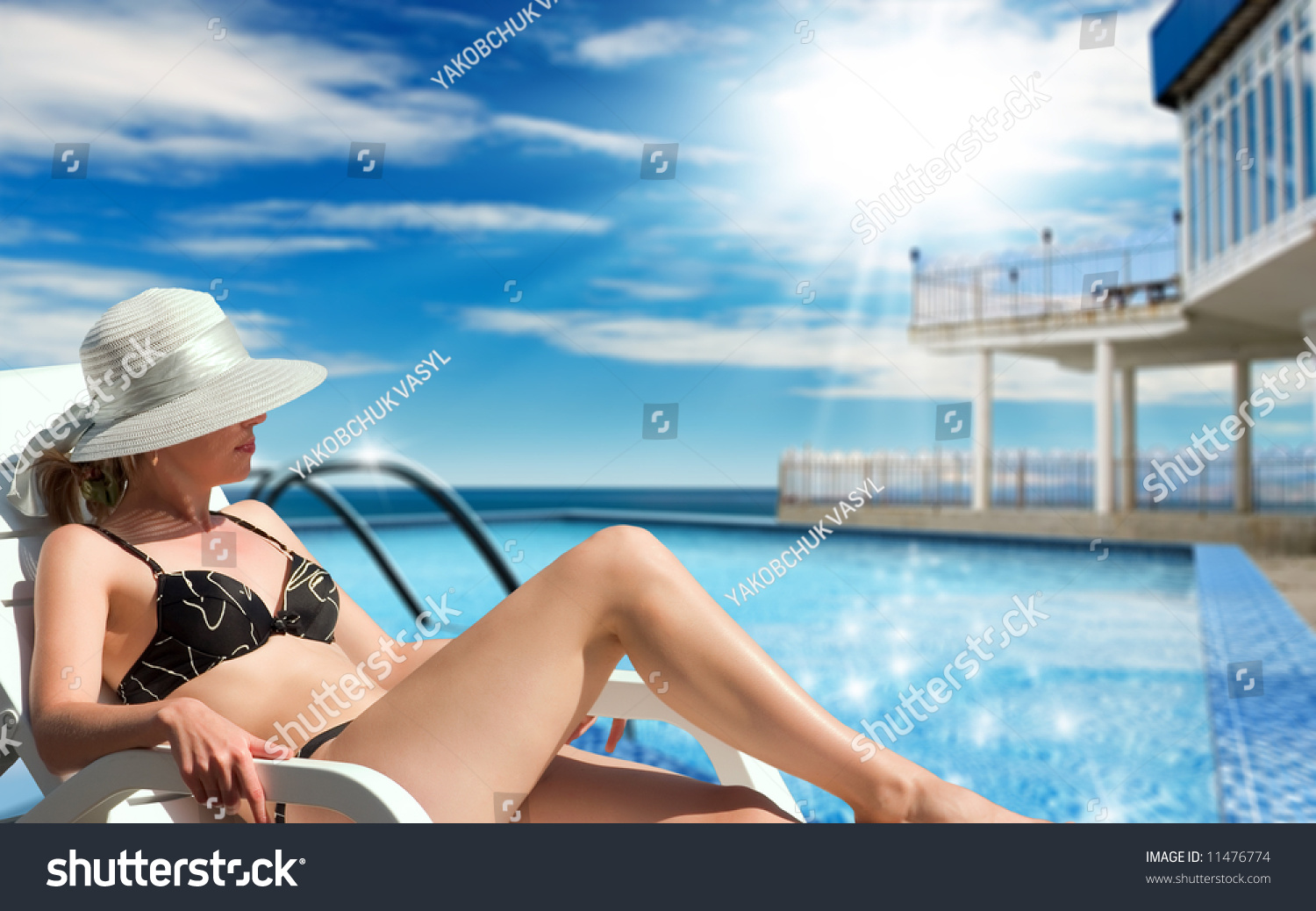 The Sunbathing Near A Swimming Pool The Sunbathing Near A Swimming Pool Stock Photo