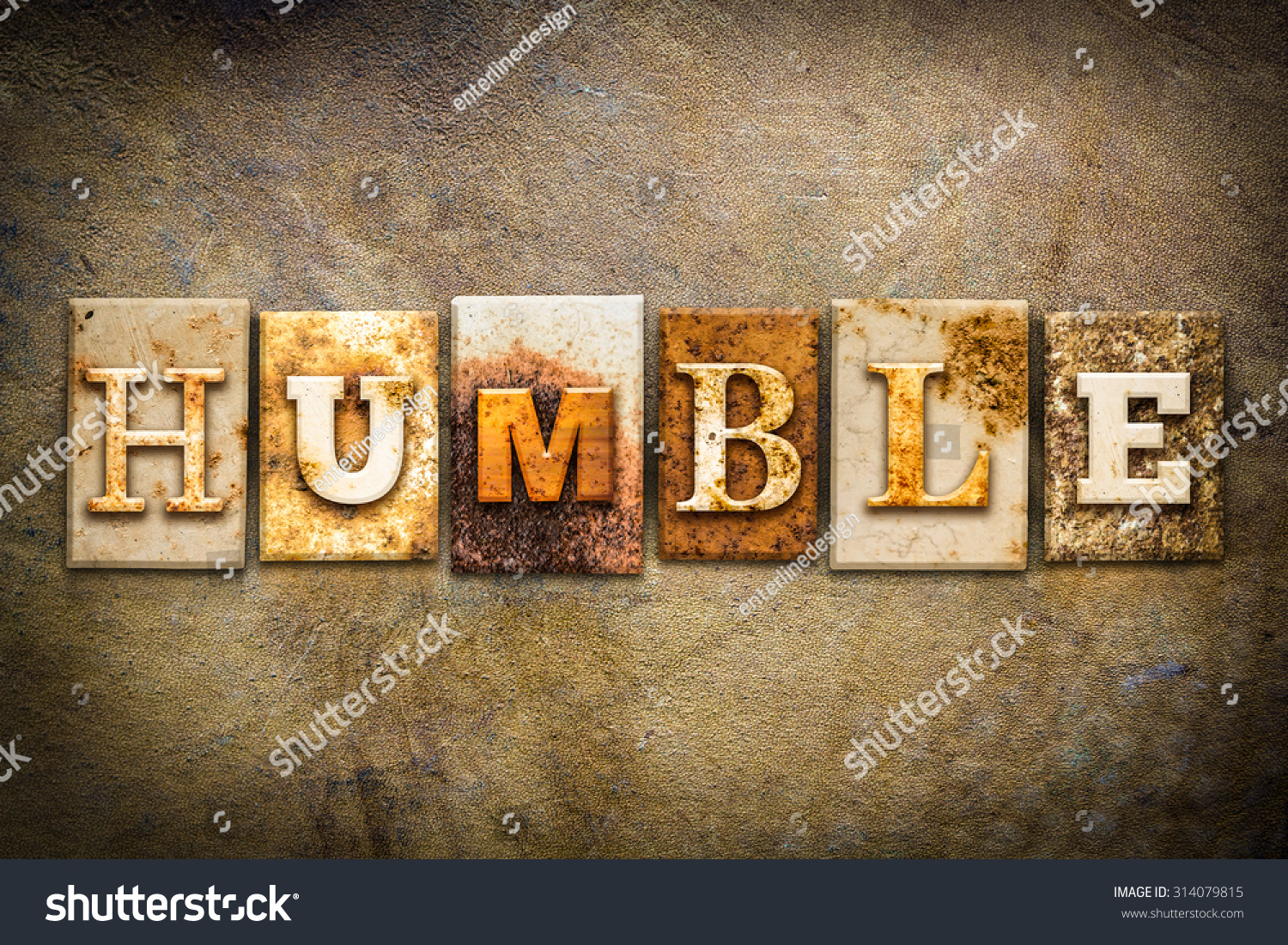 the-word-humble-written-in-rusty-metal-letterpress-type-on-an-old-aged-leather-background