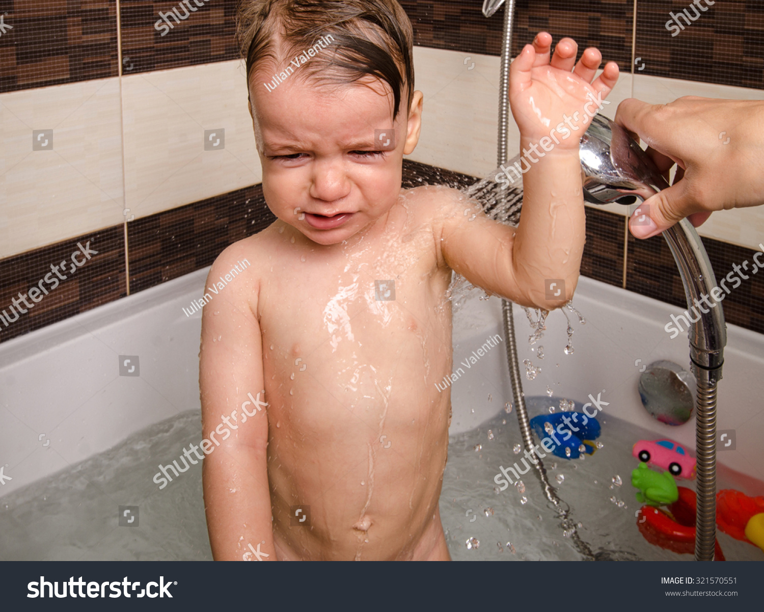 Toddler Taking A Bath And Crying Little Baby Upset In A Ba