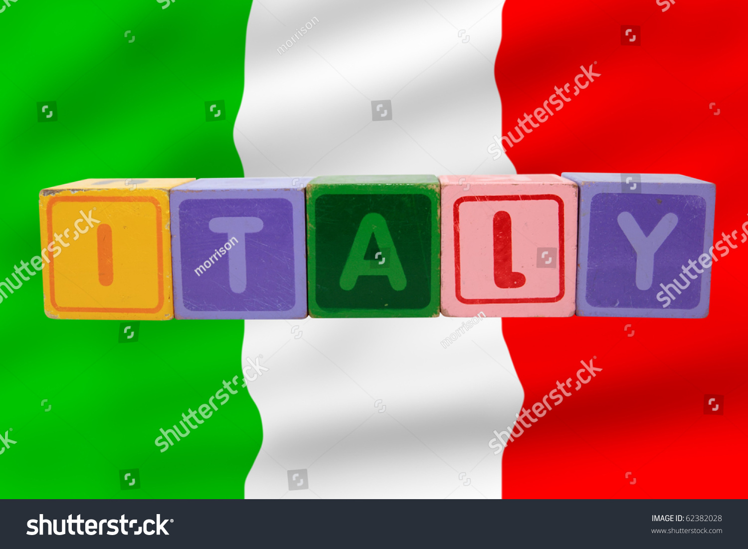 toy-letters-that-spell-italy-against-a-flag-background-with-clipping