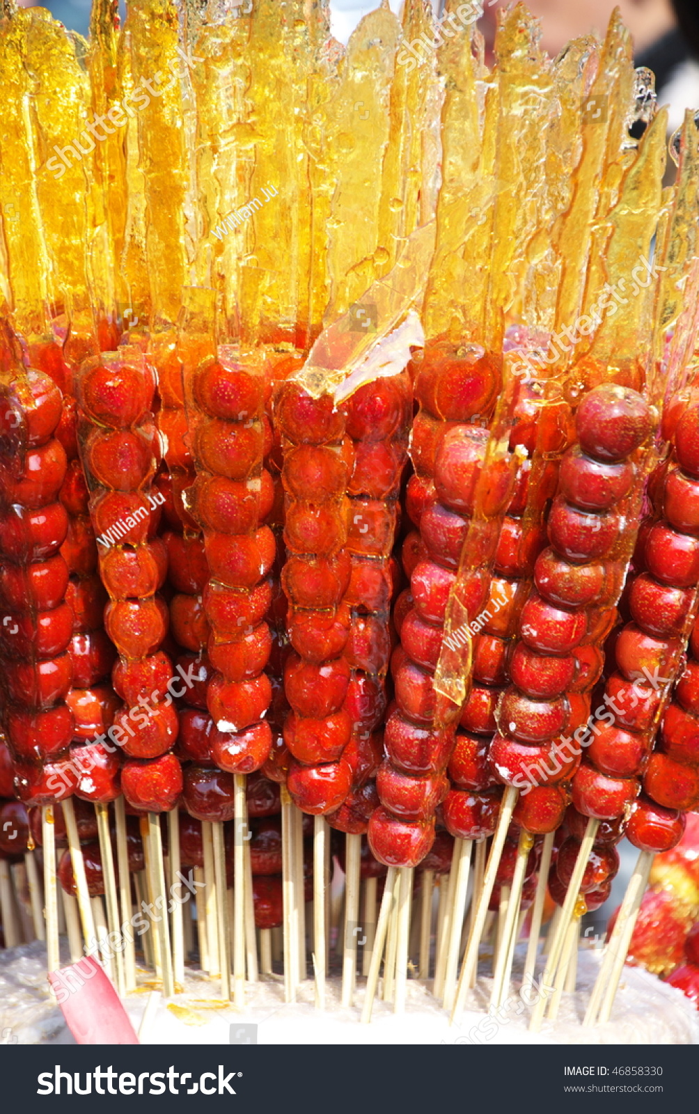 Traditional Chinese Candy Sugarcoated Haws On A Stick Stock Photo