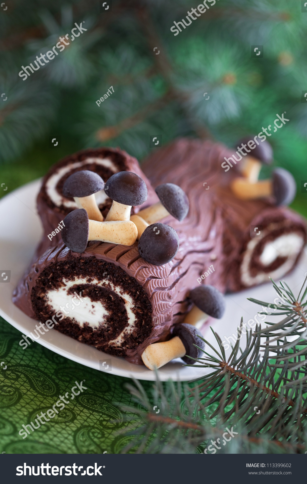 Traditional Christmas Yule Log Cake Decorated With Chocolate Mushrooms ...