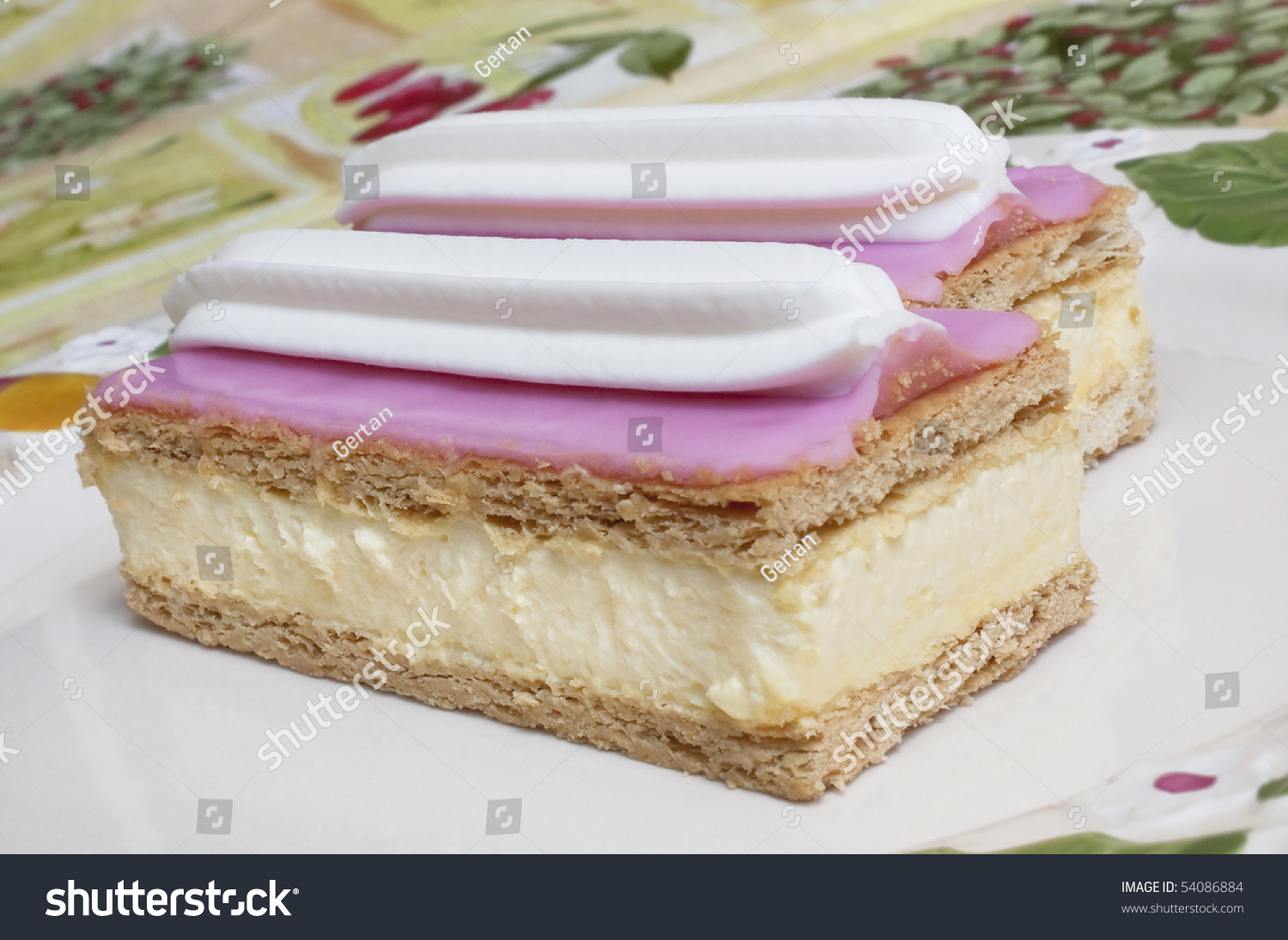 Traditional Dutch Pastry Tompouce Cakes On White Plate On Table Stock