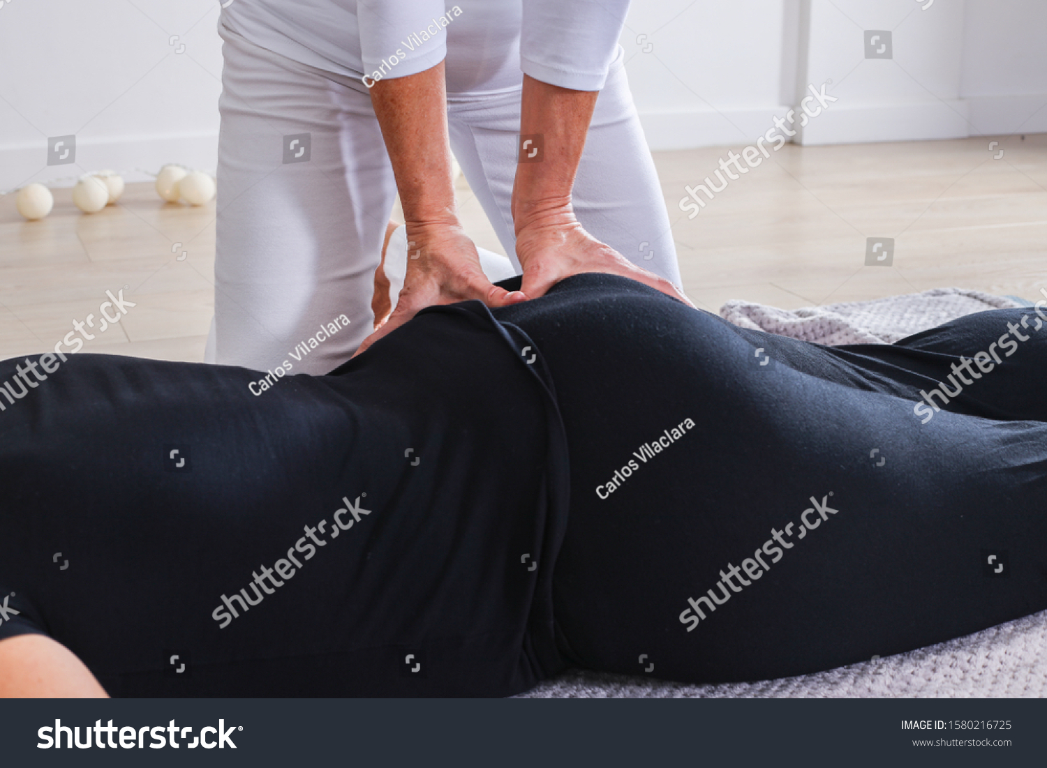 Traditional Shiatsu Massage Done By Mature Stock Photo Edit Now