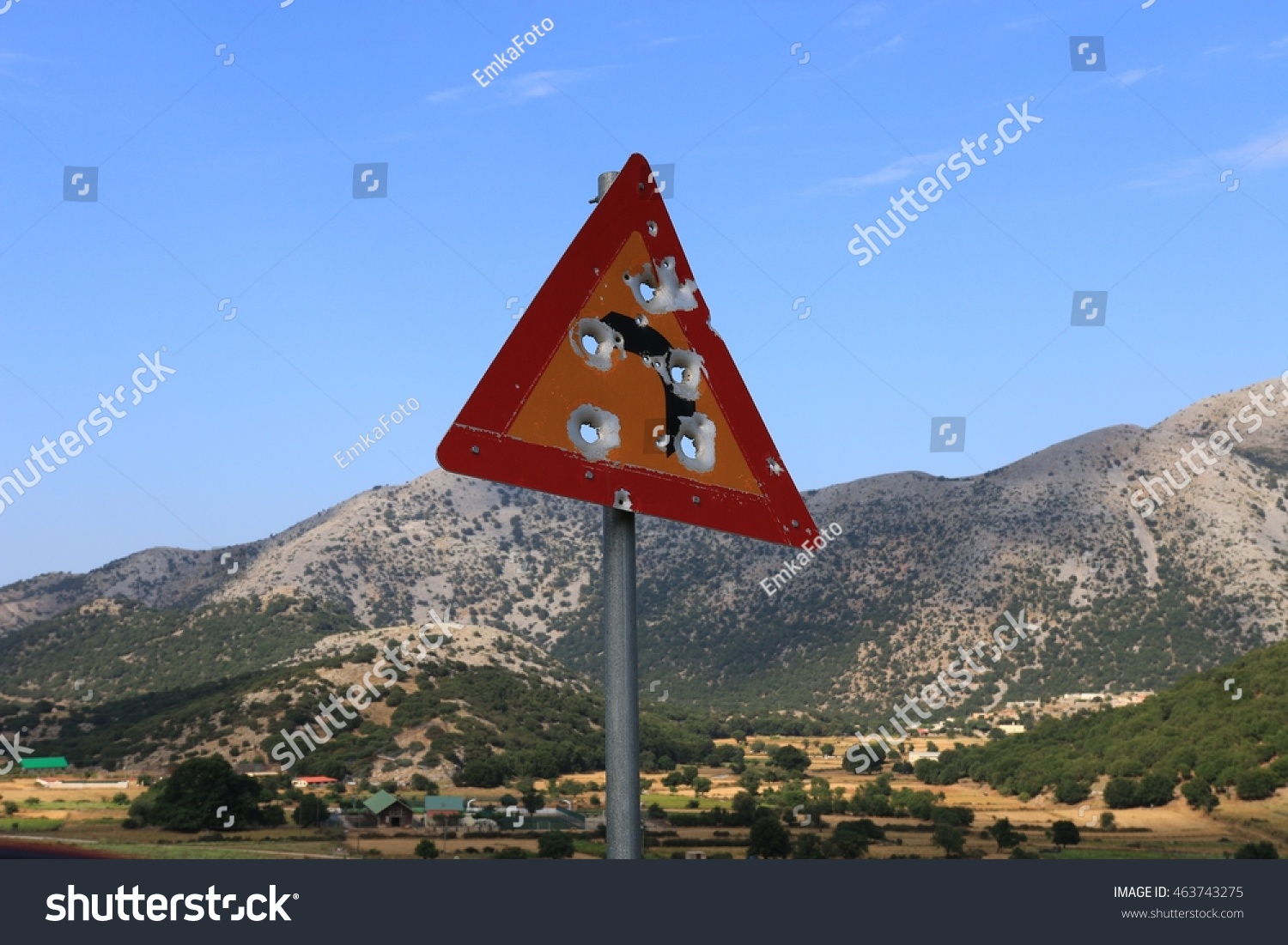 Traffic sign with bullet holes Traffic sign with bullet holes