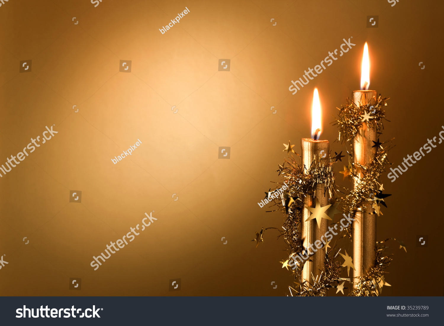 Two Golden Candles With Stars Stock Photo 35239789 Shutterstock