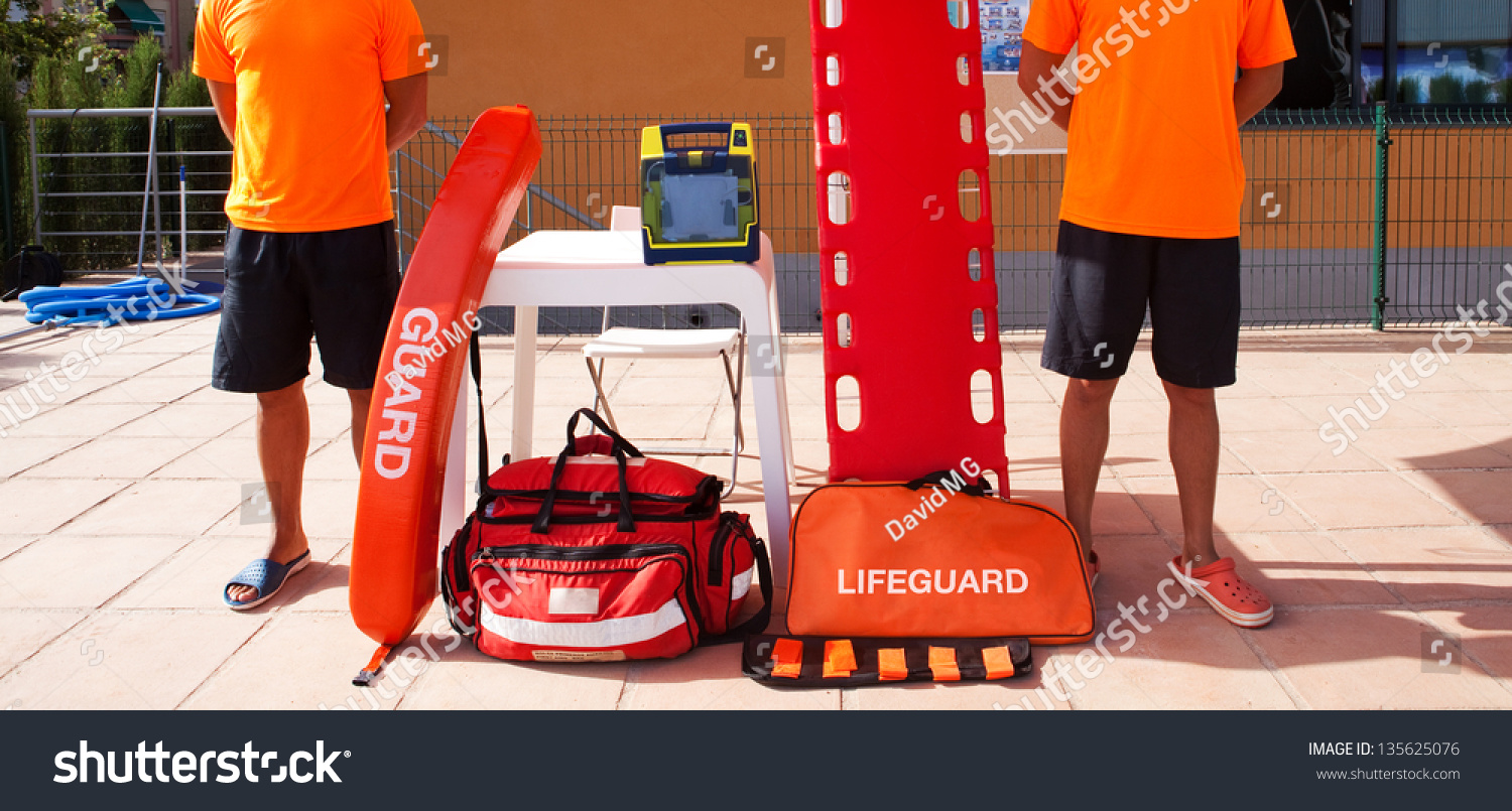 Two Lifeguards With Their Equipment. Stock Photo 135625076 : Shutterstock