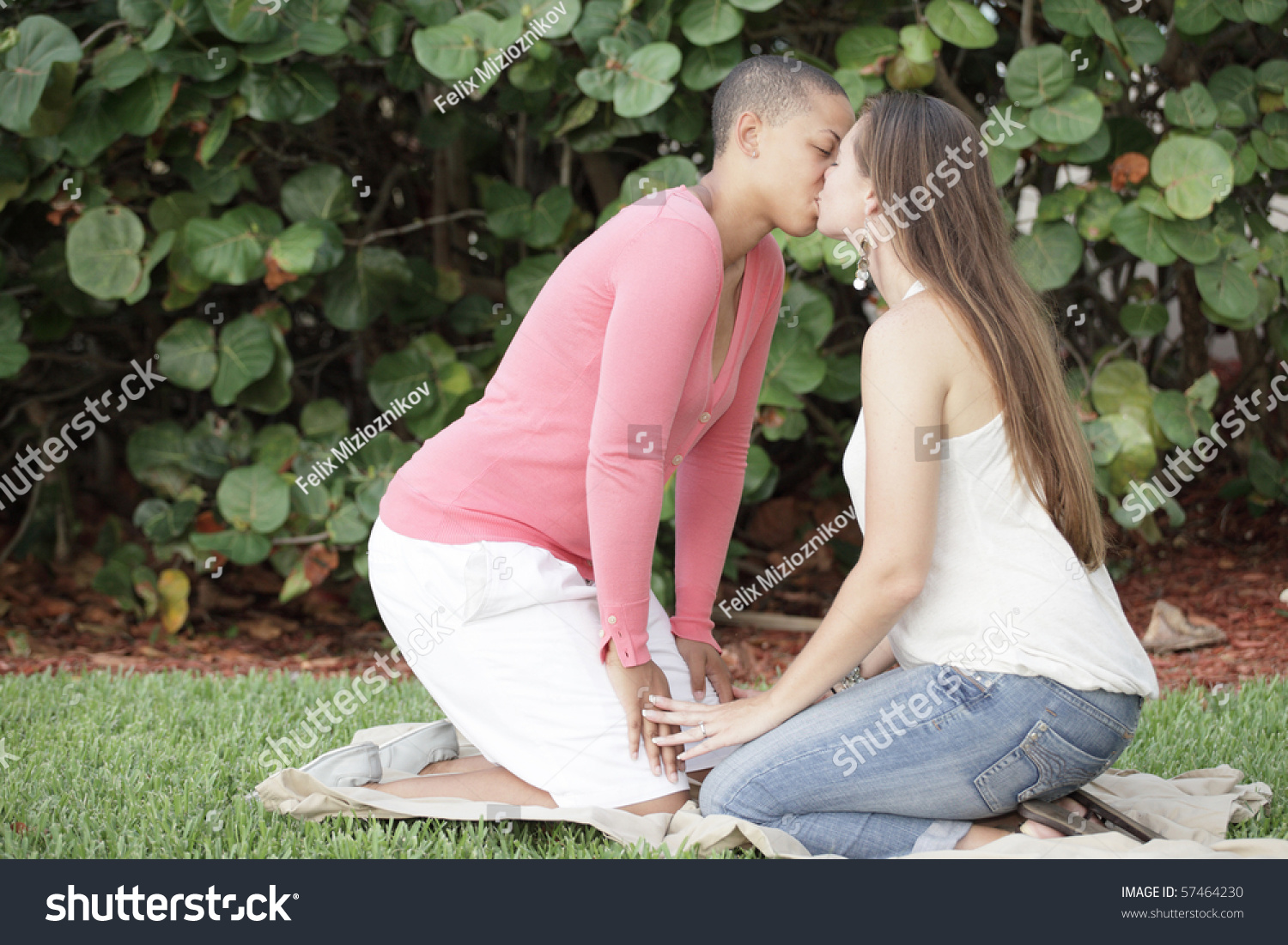 Two Young Women Kissing In The Park Stock Photo 57464230 : Shutterstock