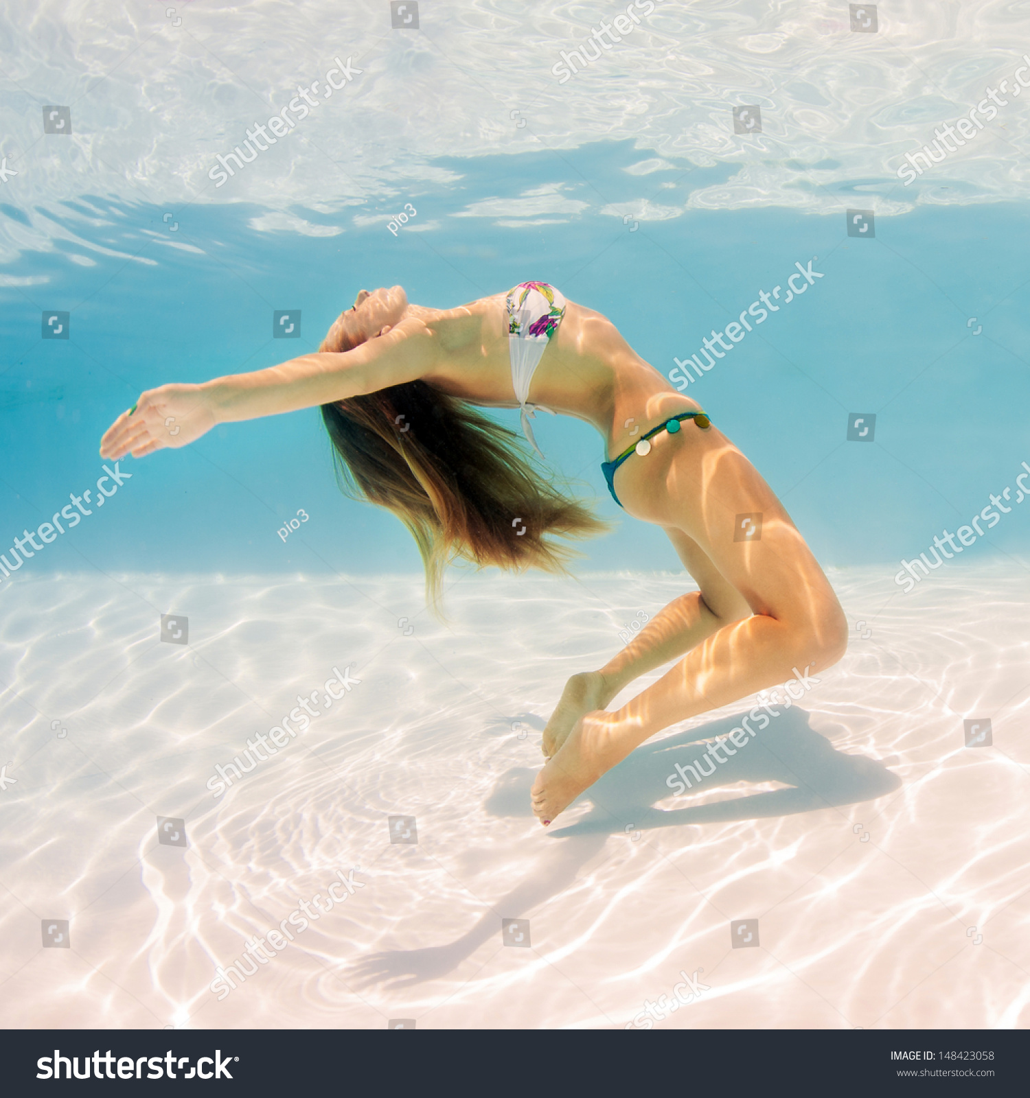 Underwater Woman Portrait Wearing Bikini In Swimming Pool Stock Photo