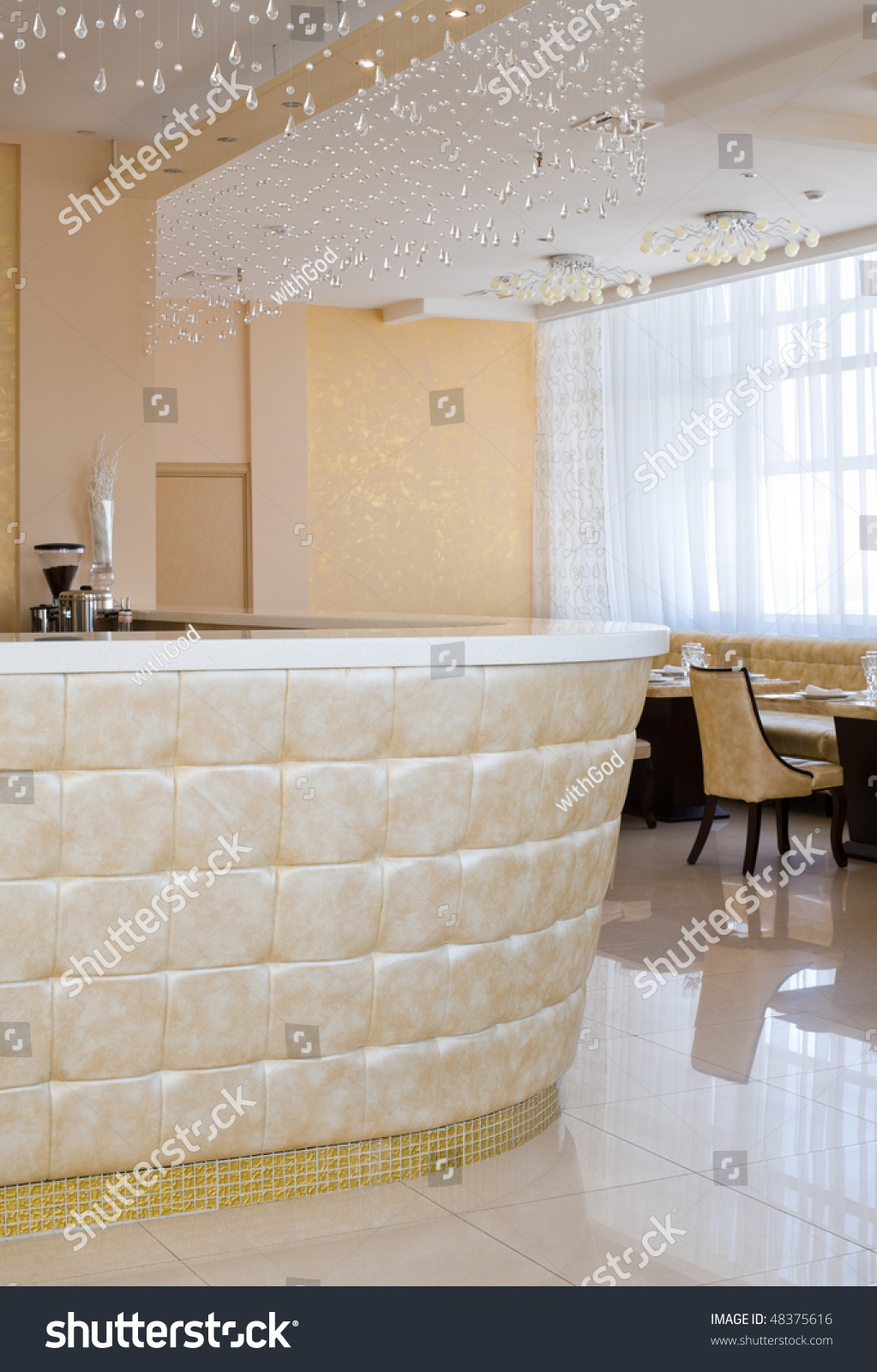 upholstered bar with crystal curtain in restaurant interior of upholstered bar with crystal curtain in restaurant interior of