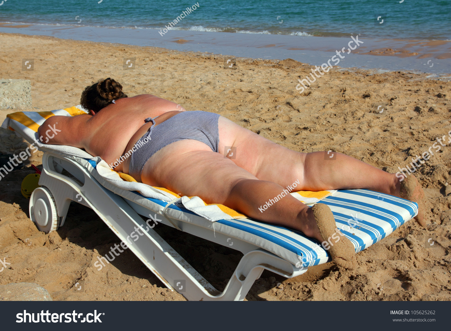 stock-photo-vacation-overweight-woman-su