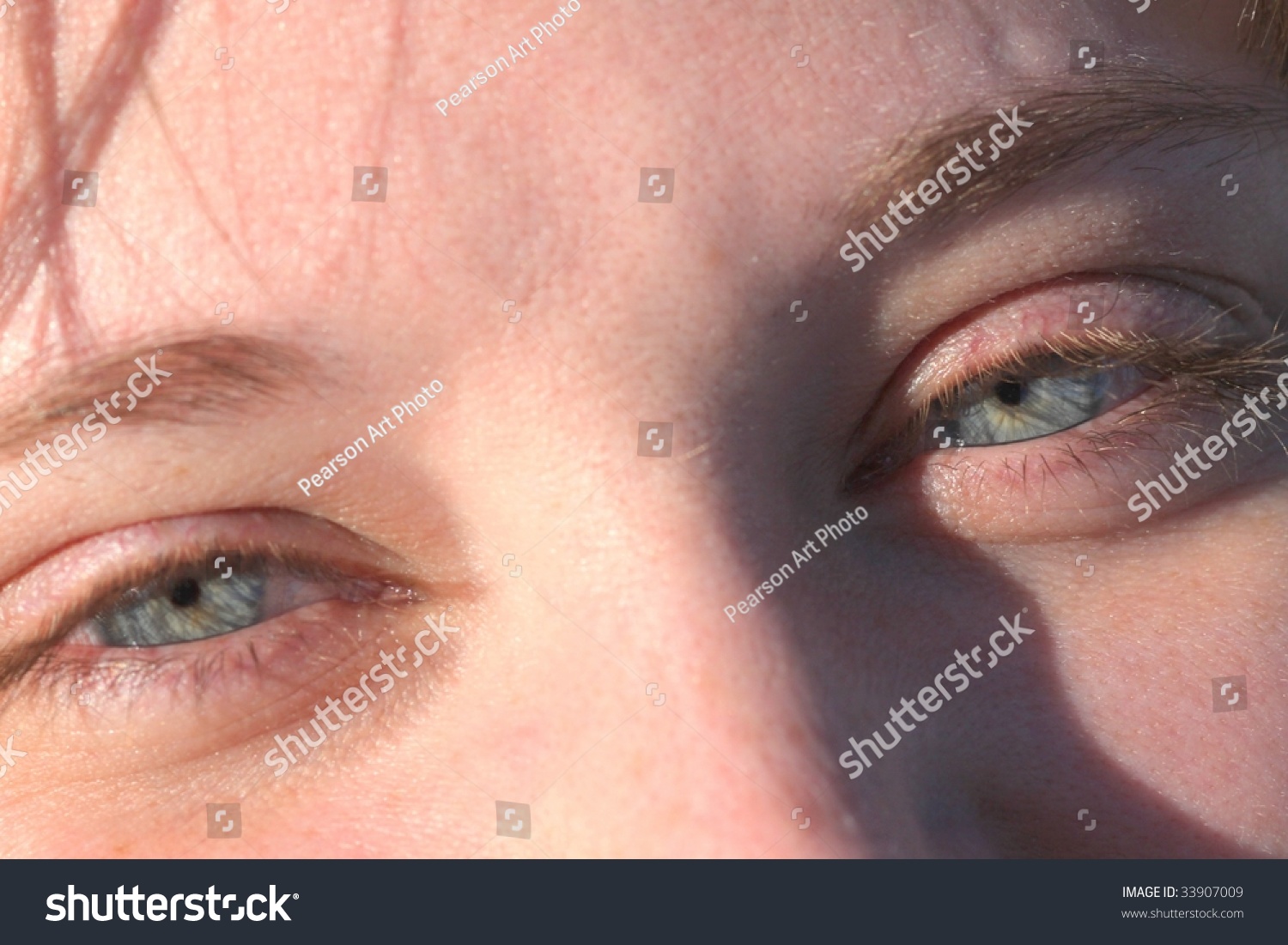 Very Close Up Shot Of Two Beautiful Longing Wispy Blue Eye