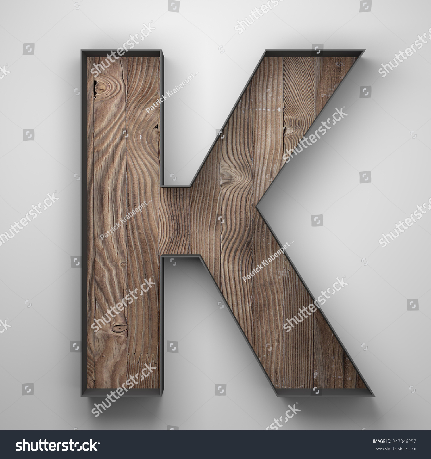 Vintage Wooden Letter K With Metal Frame Stock Photo