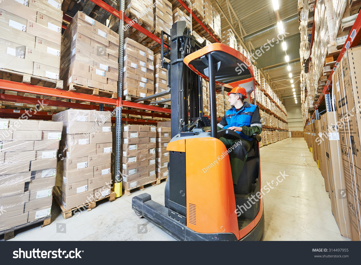 warehouse forklift stacker loader stacking cardboxes in storehouse warehouse forklift stacker loader stacking cardboxes in storehouse