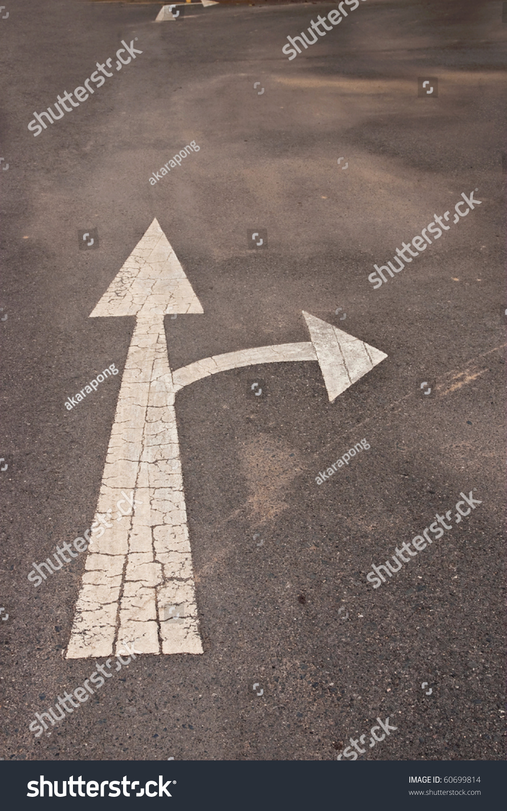 white-arrow-marking-on-road-stock-photo-60699814-shutterstock