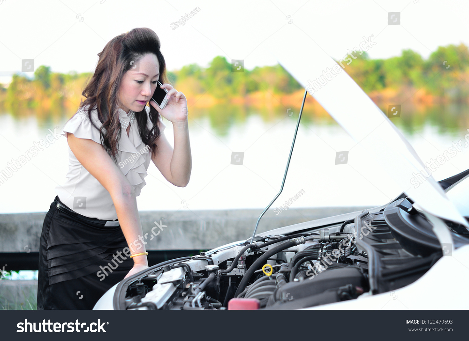 Woman Driver On The Phone For Car Breakdown | woman driver on the phone for car breakdown stock photo Woman Driver On The Phone For Car Breakdown | woman driver on the phone for car breakdown stock photo