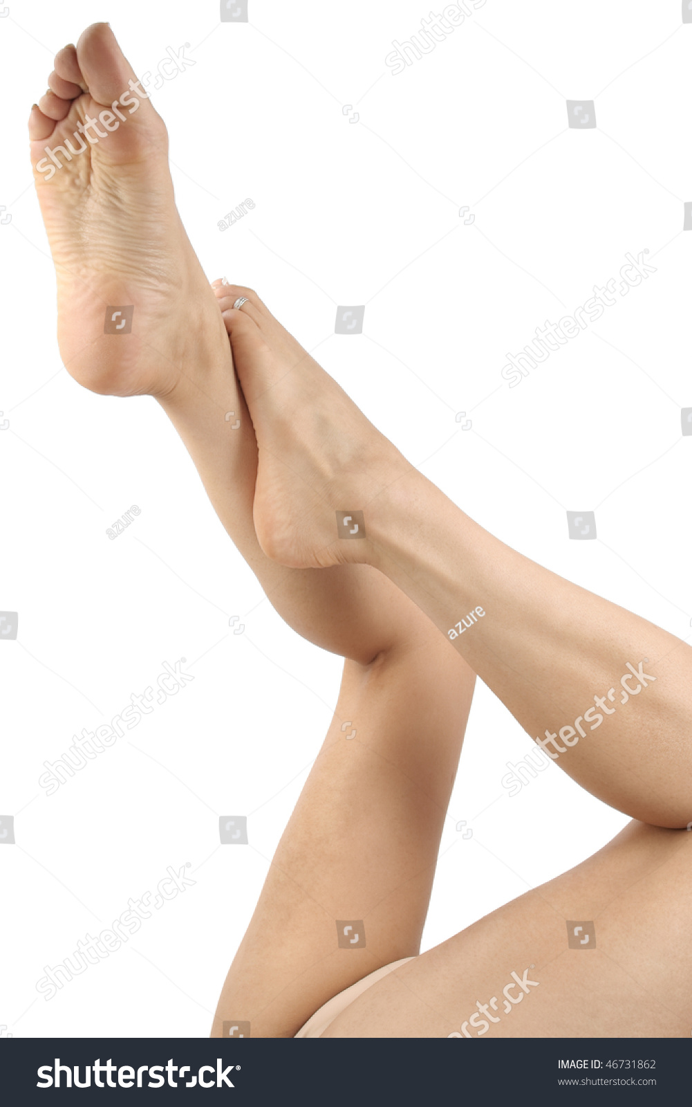 Woman Legs And Feet Isolated Over White Background Stock
