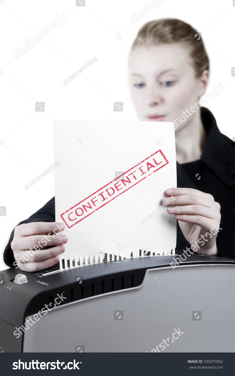 Woman Shredding A Confidential Paper Stock Photo Shutterstock