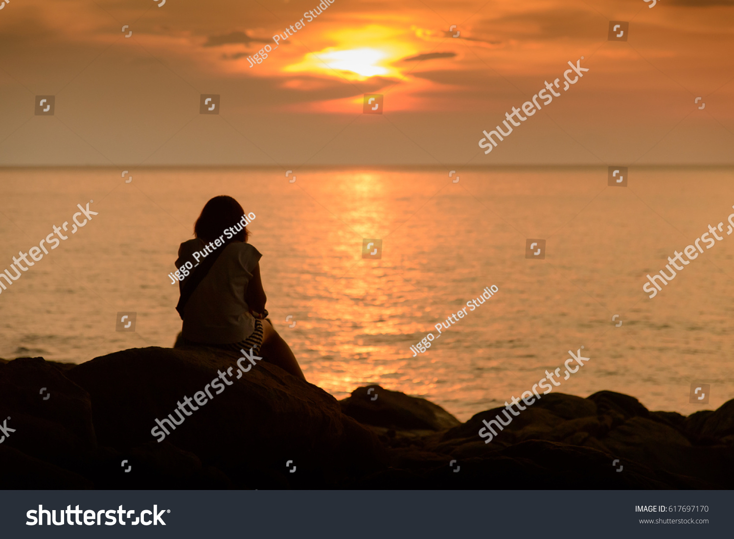 Woman Silhouette Watching Sun On Beach Stock Photo Shutterstock