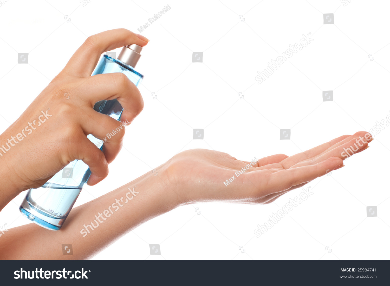 Woman Spraying Perfume On Hands Stock Photo 25984741 : Shutterstock