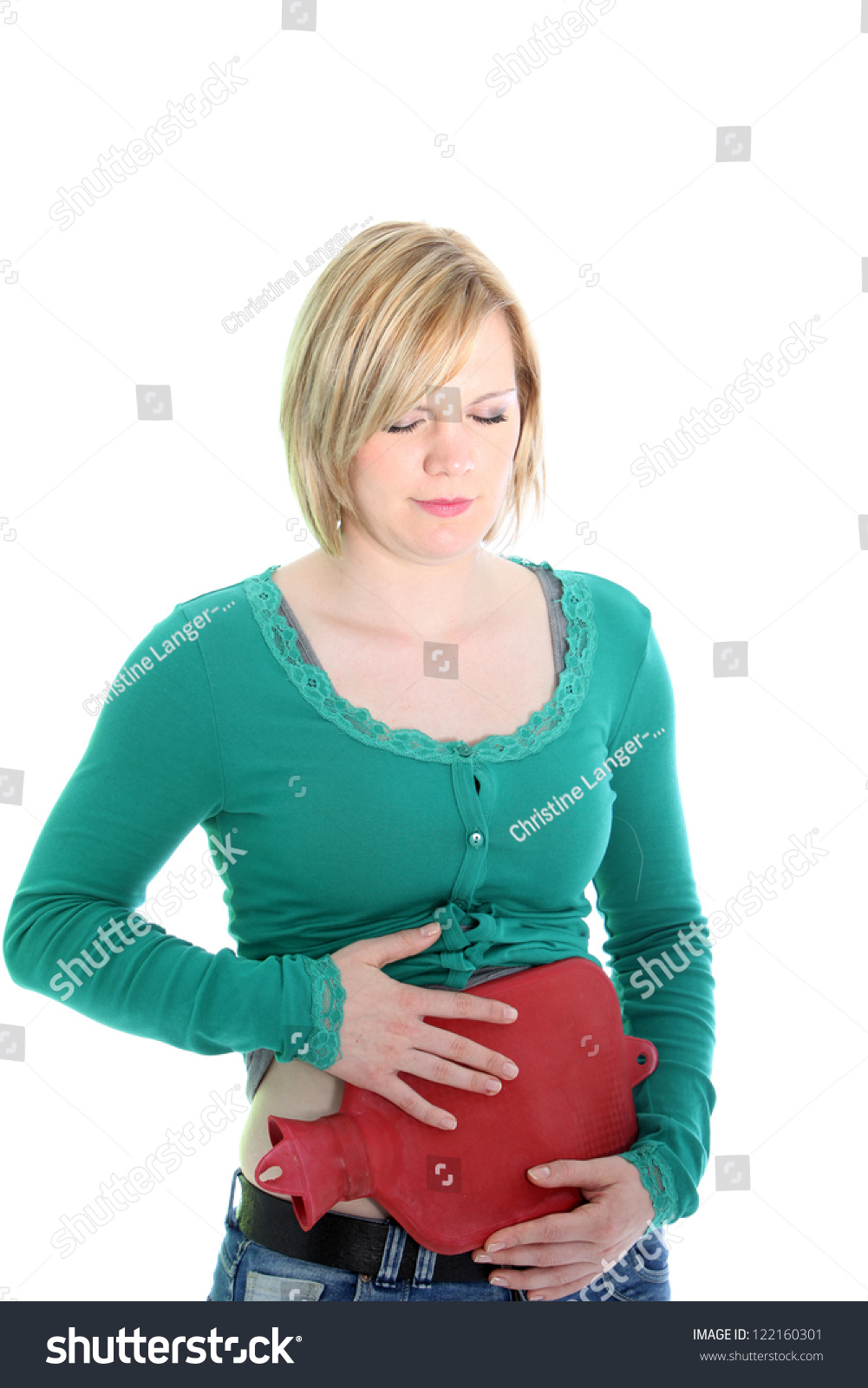 woman-suffering-from-a-stomach-ache-holding-a-warm-hot-water-bottle-to