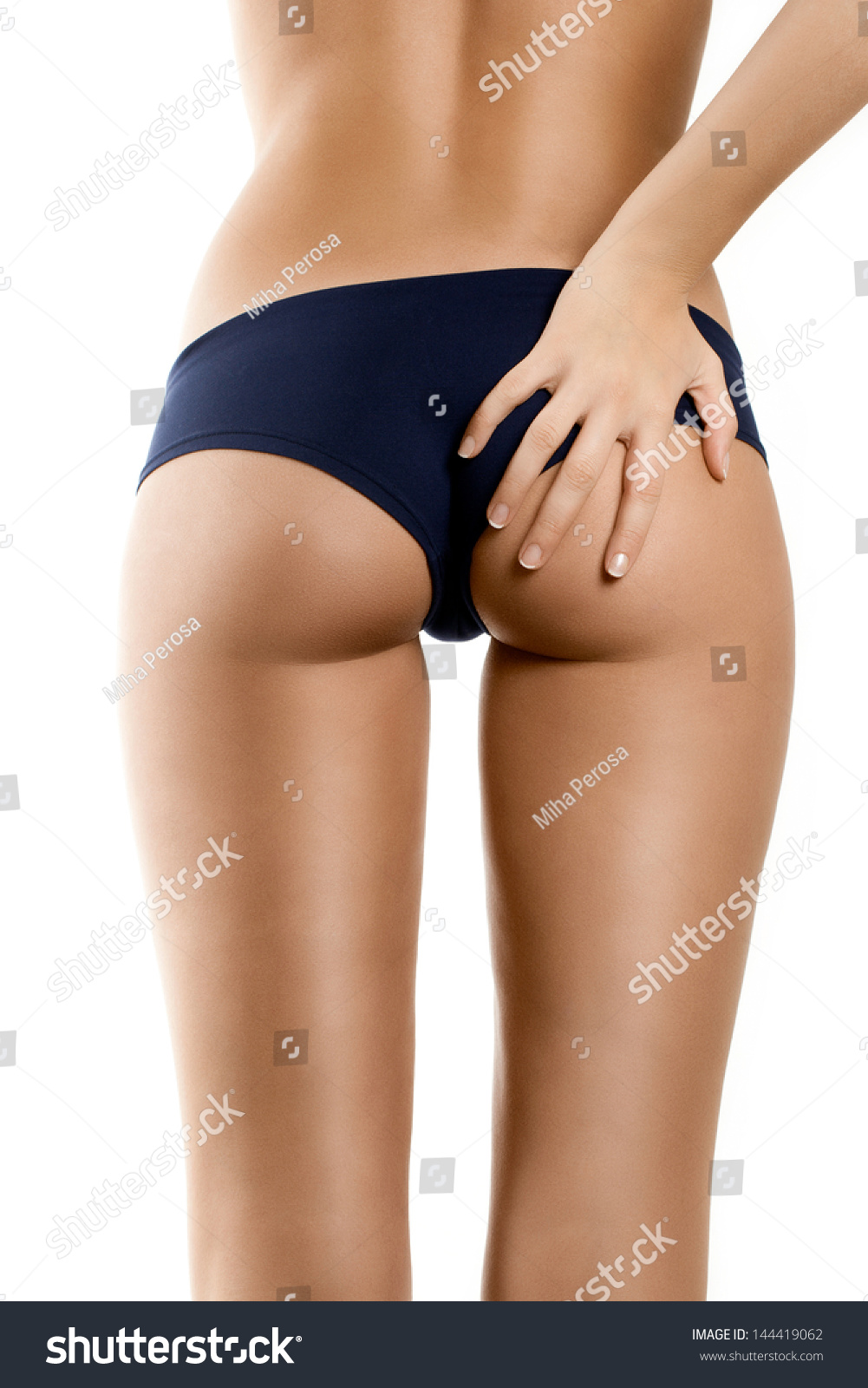 Woman With Perfect Shape Beautiful Buttocks Hand On White Stock