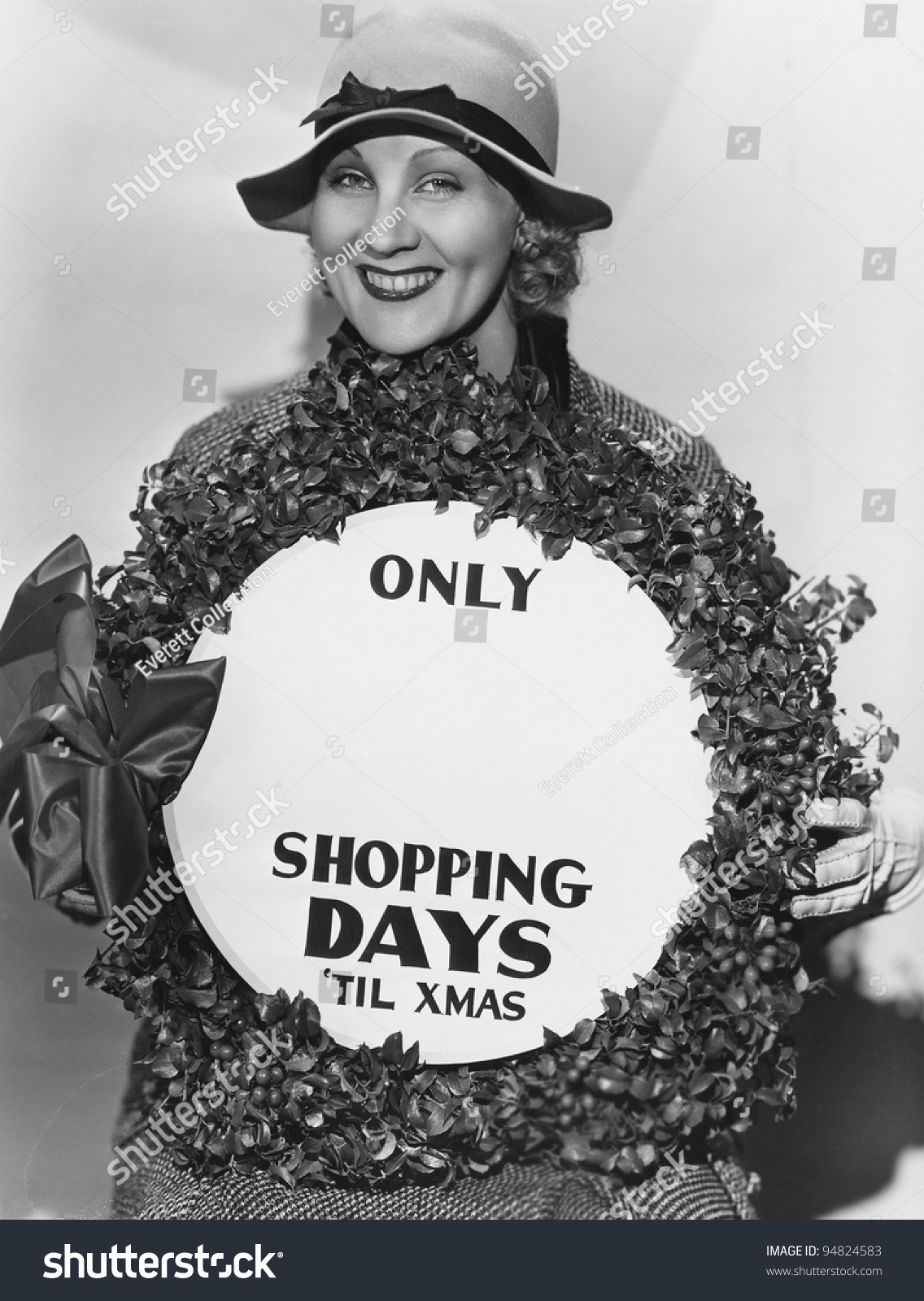 Woman With Sign With Number Of Shopping Days Until Christmas Stock