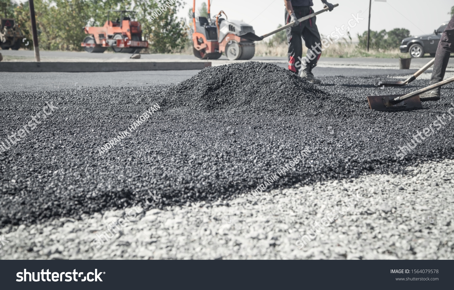 Workers Arranging Asphalt Road Construction Industry Stock Photo