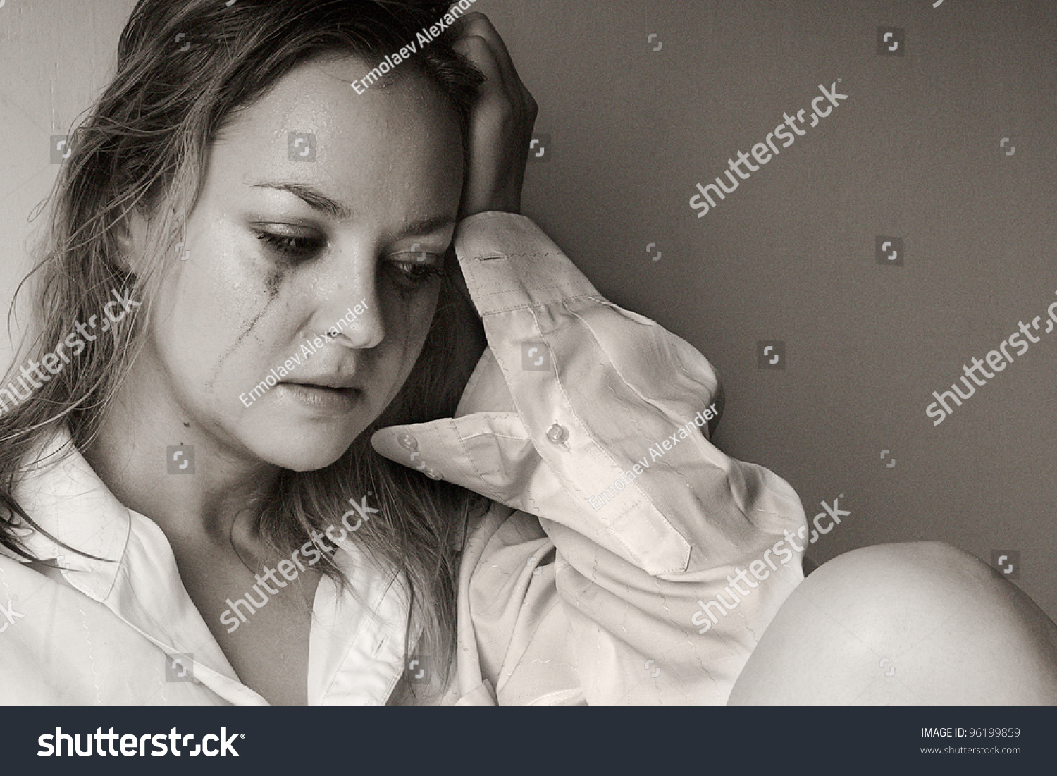 Young Beautiful Woman Suffering From A Severe Depression Stock Photo