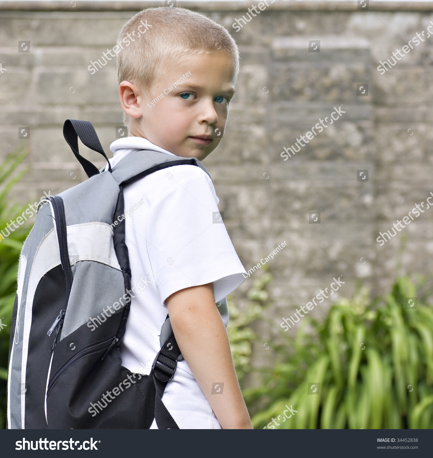 toddler wearing backpack