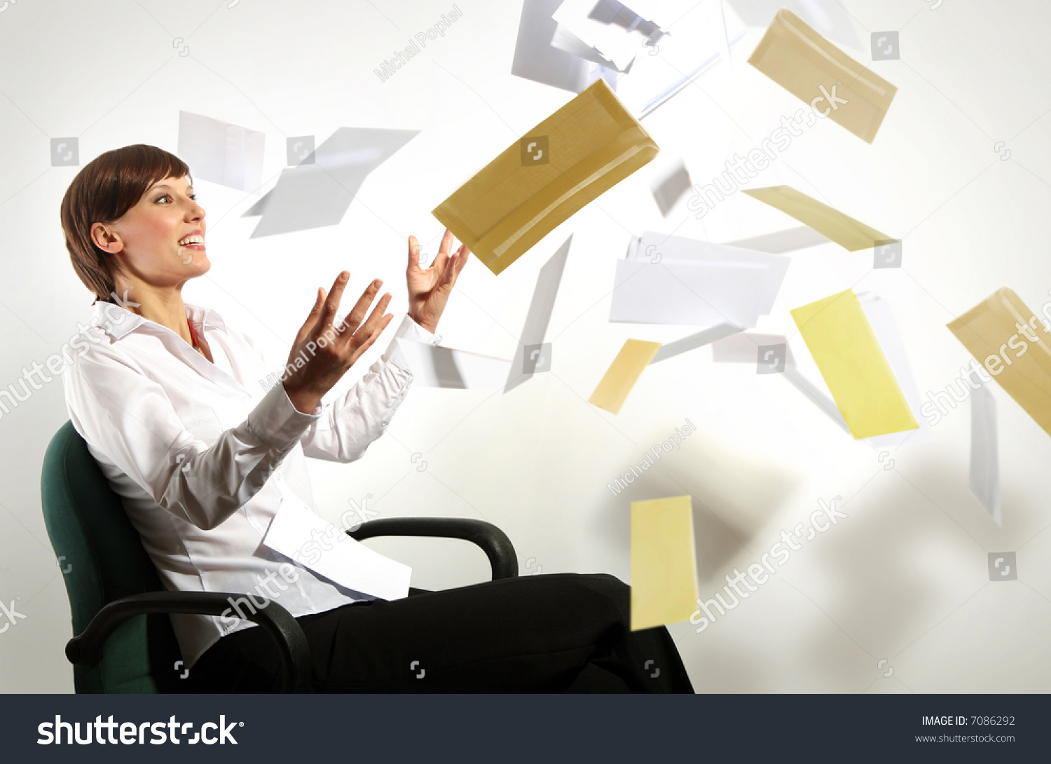 Young Business Woman On Chair, Throwing Letters In Air, Smiling Stock