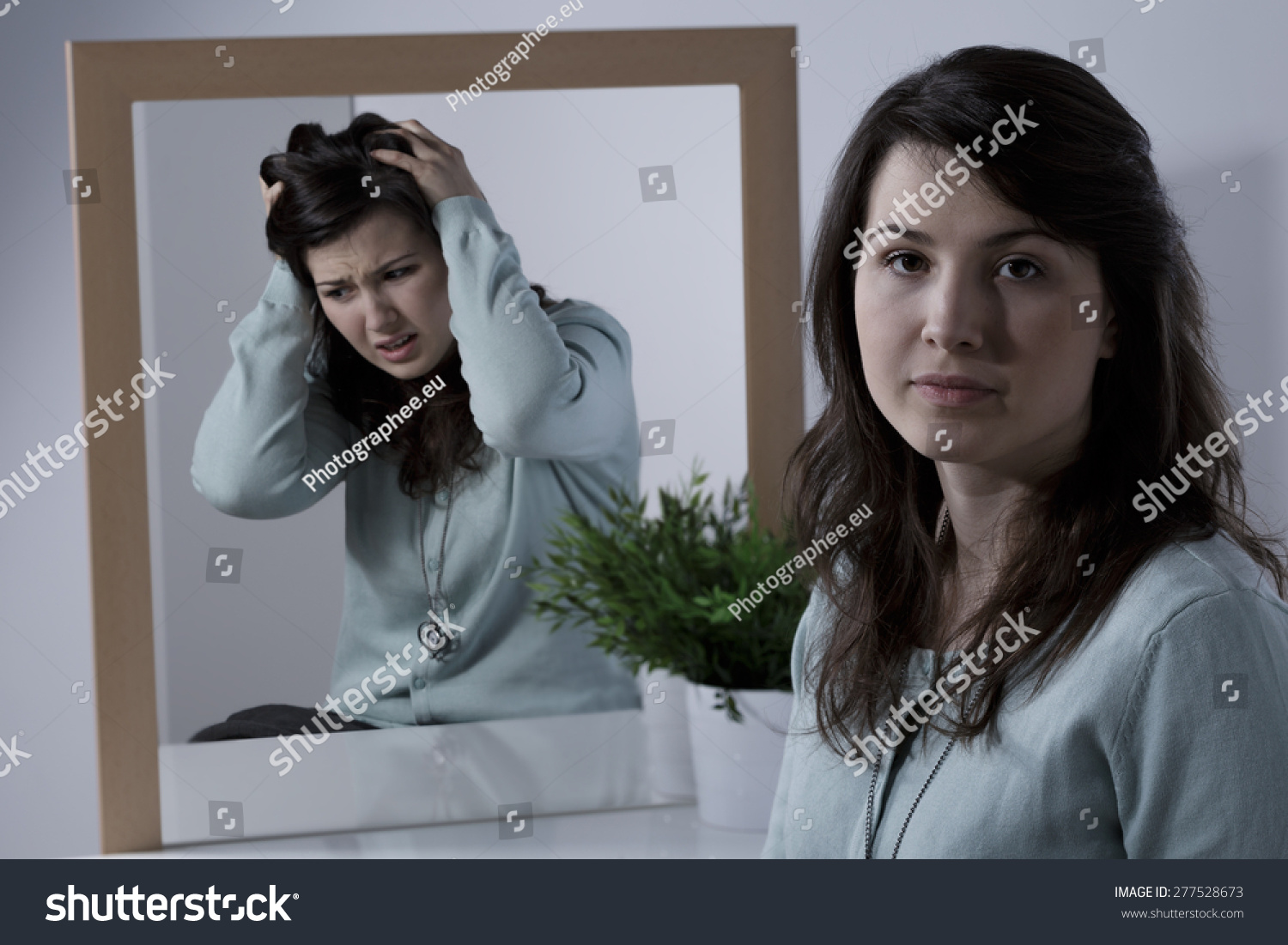 young-emotionally-unstable-woman-with-bipolar-disorder-stock-photo