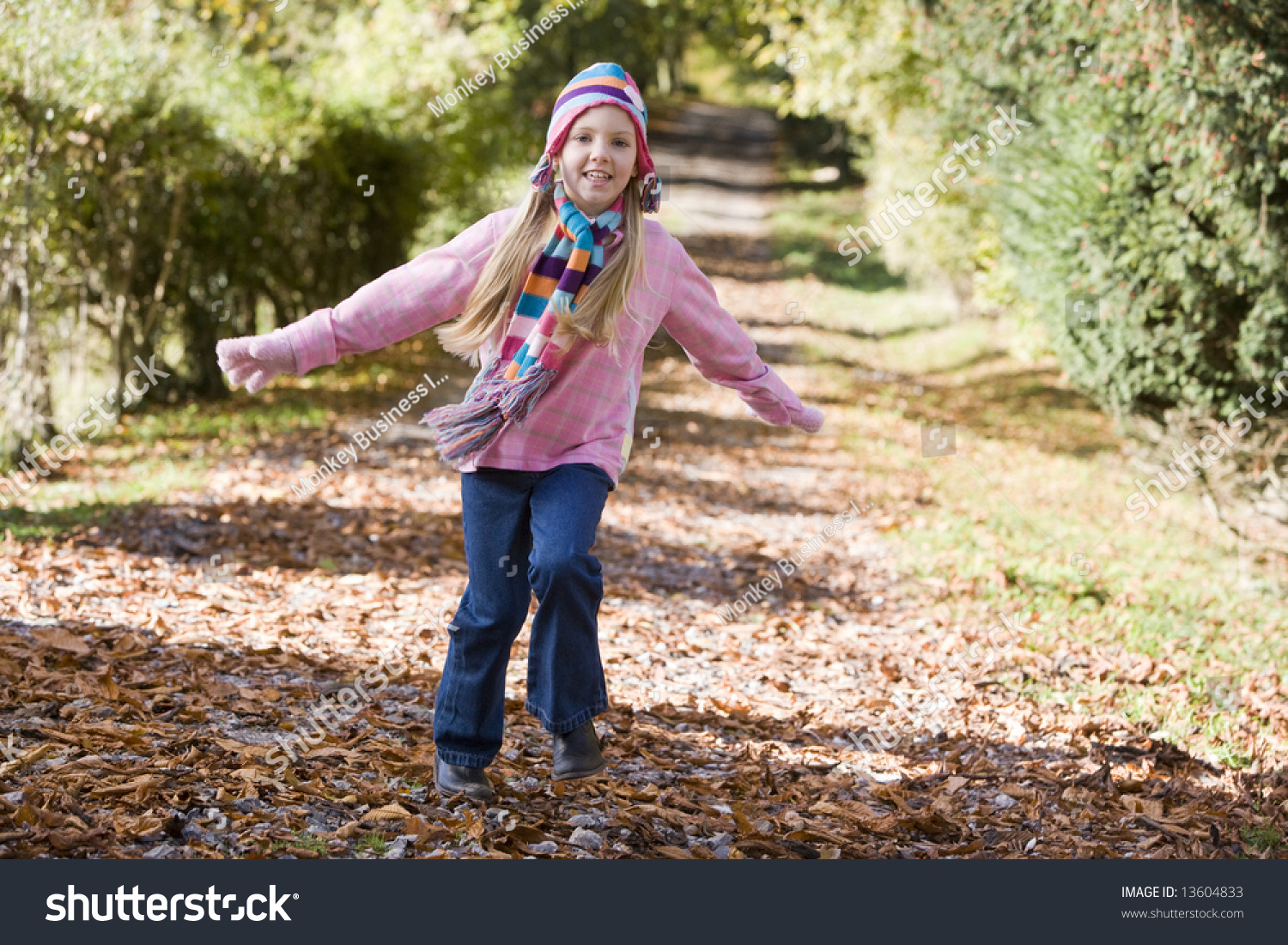 Young Girl Running Through Autumn Woods Stock Photo 13604833 : Shutterstock