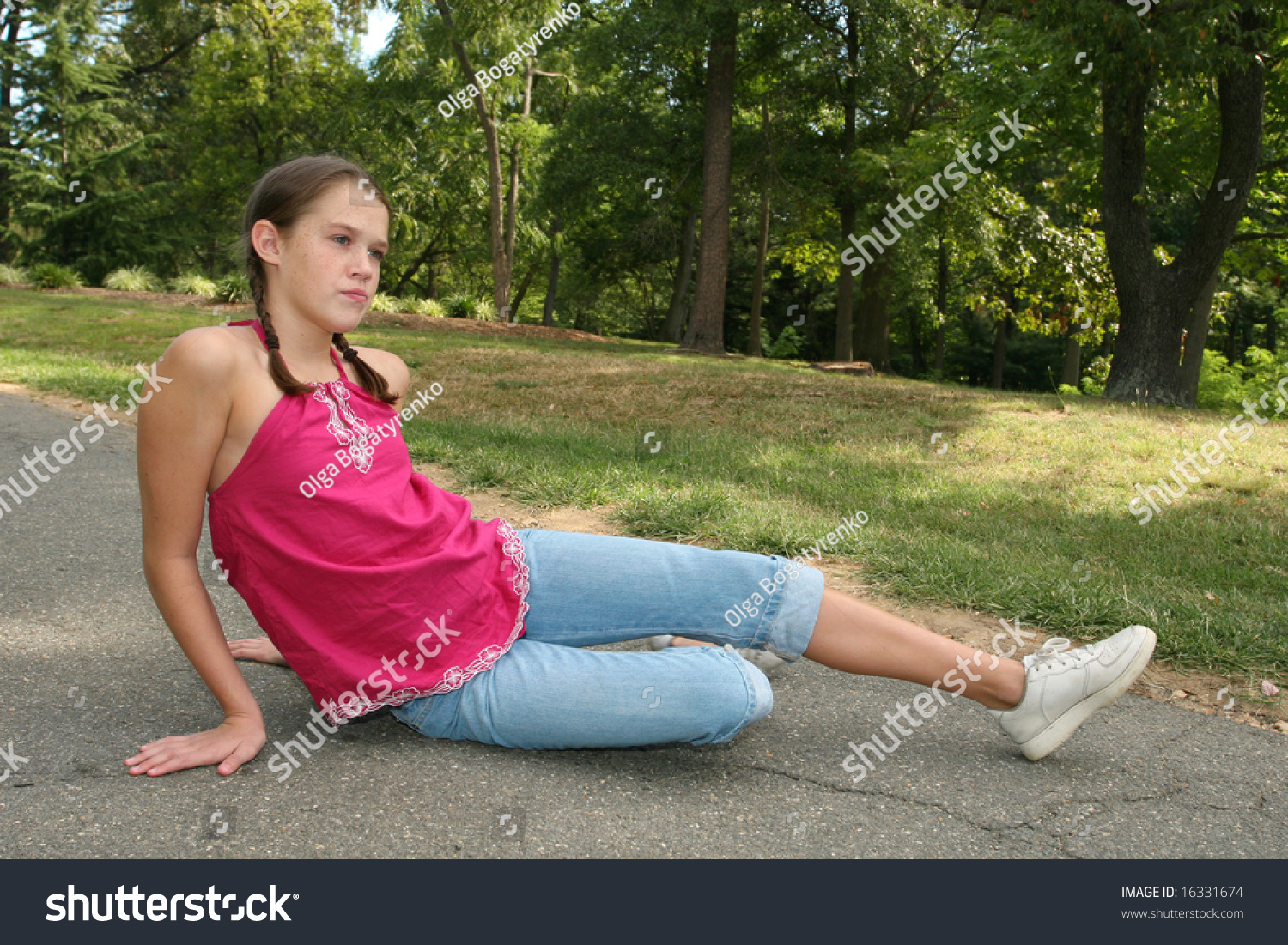 Young Girl Sitting Down Stretching On Stock Photo 163