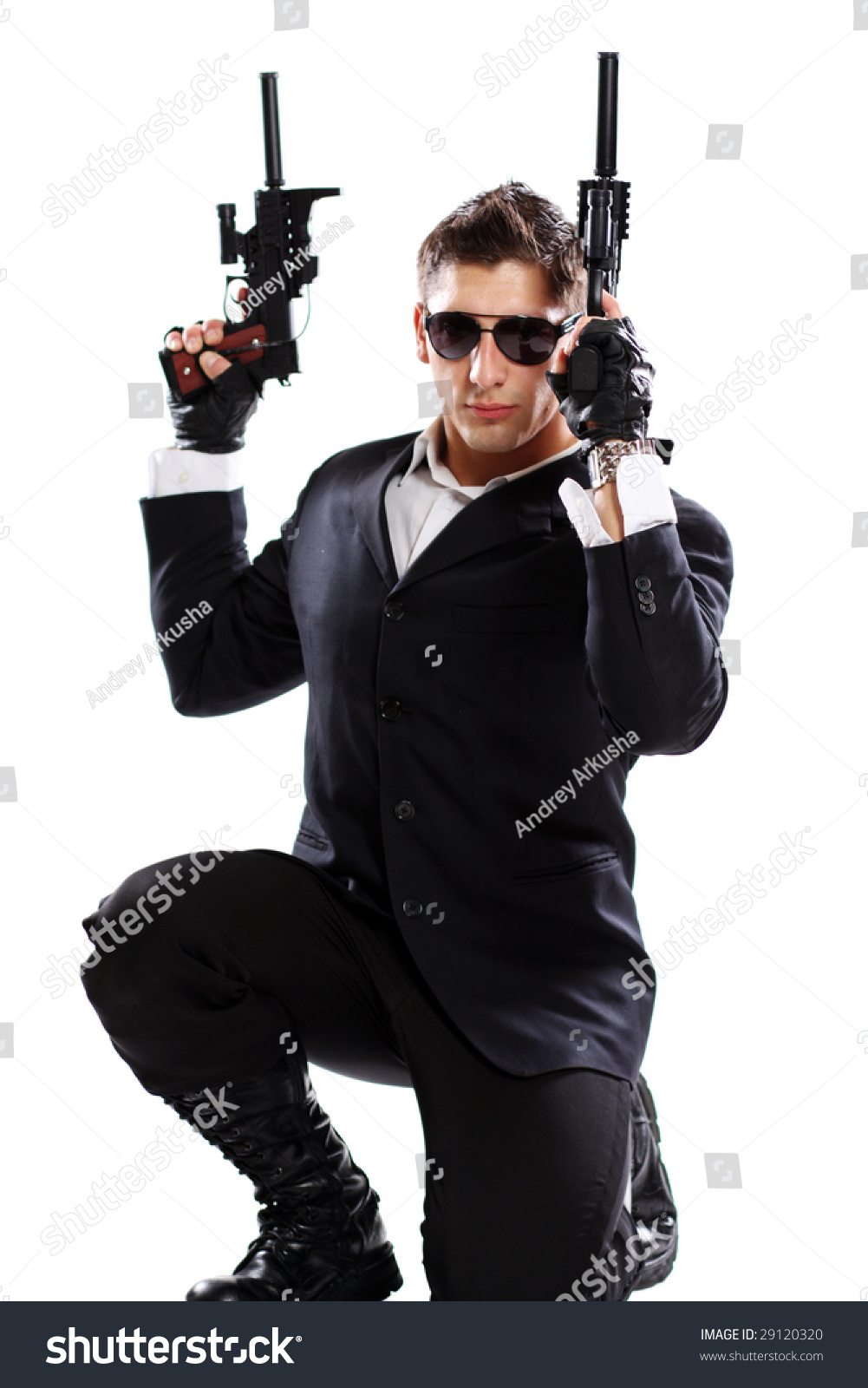 Young Man Black Suit Holding Gun Stock Photo 29120320 - Shutterstock