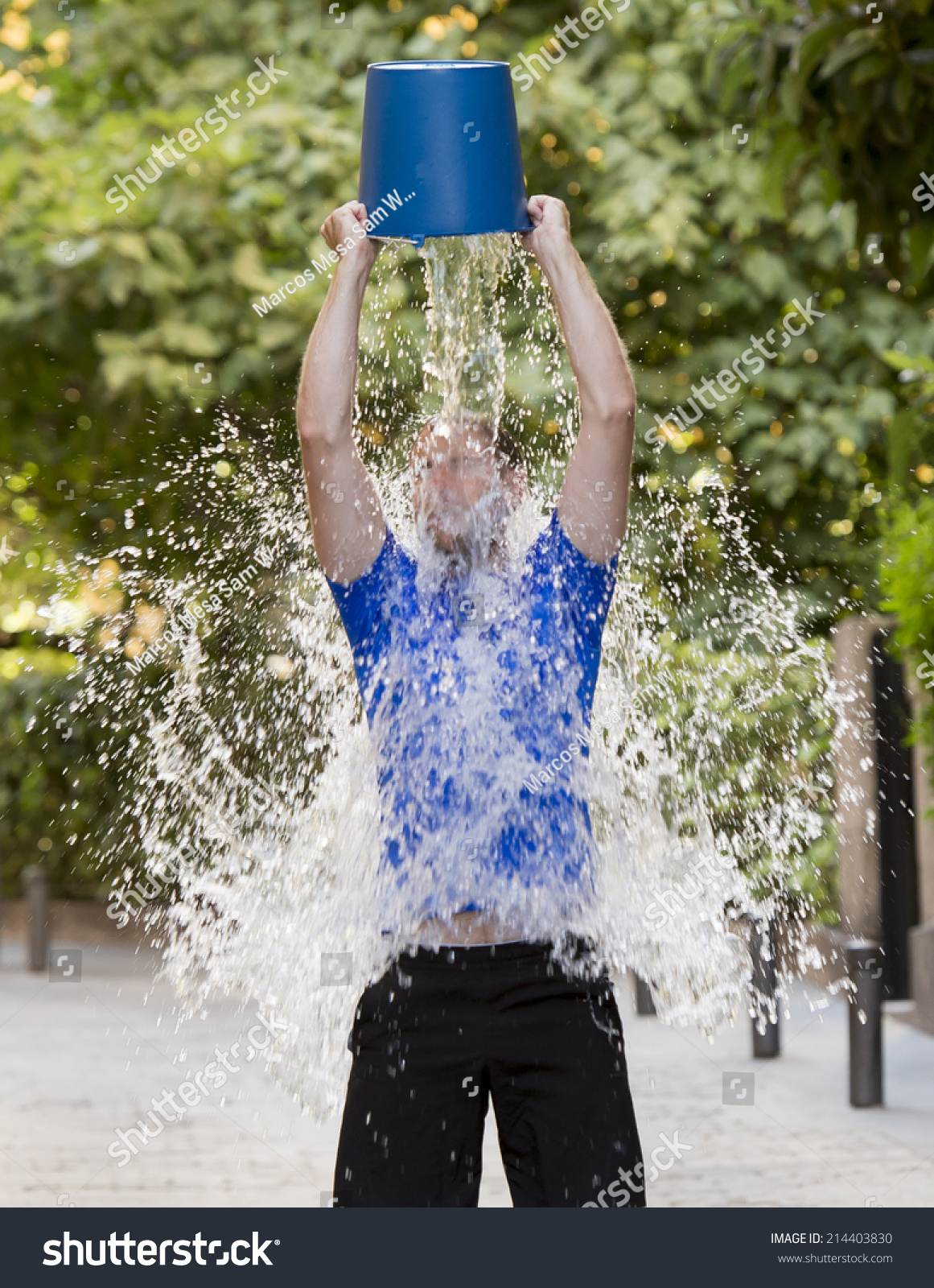 Young Man Pouring Ice Water Bucket Stock Photo 214403830 Shutterstock