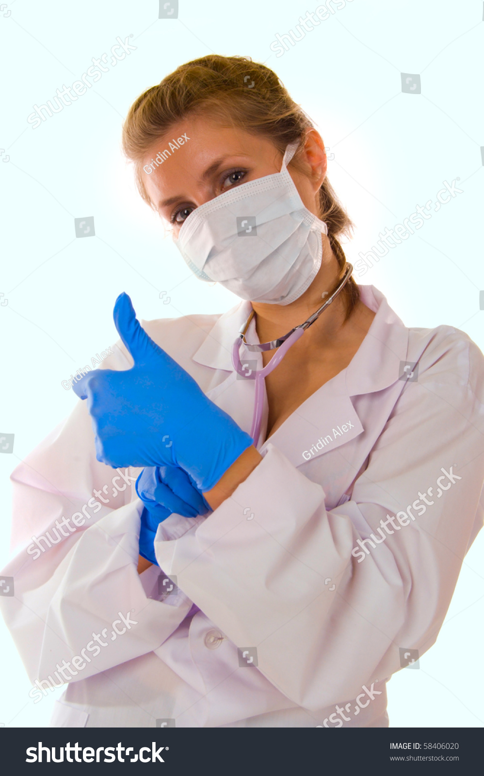 Young Nurse In Blue Gloves Sto