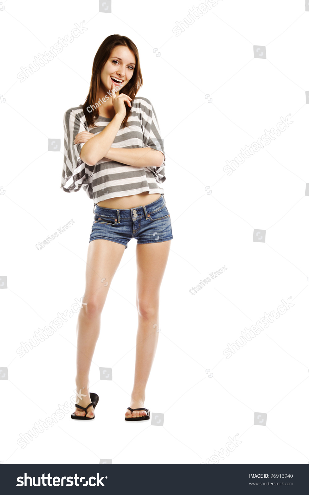 Young Woman Wearing Sexy Jeans Shorts - Isolated Stock Photo 96913940 