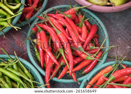 Red chili pepper in the basket for sale in the wet market