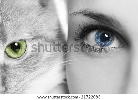 woman with blue eyes and cat with green eyes