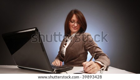 young businesswoman working in office