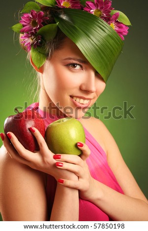 beautiful spring-woman with two apples